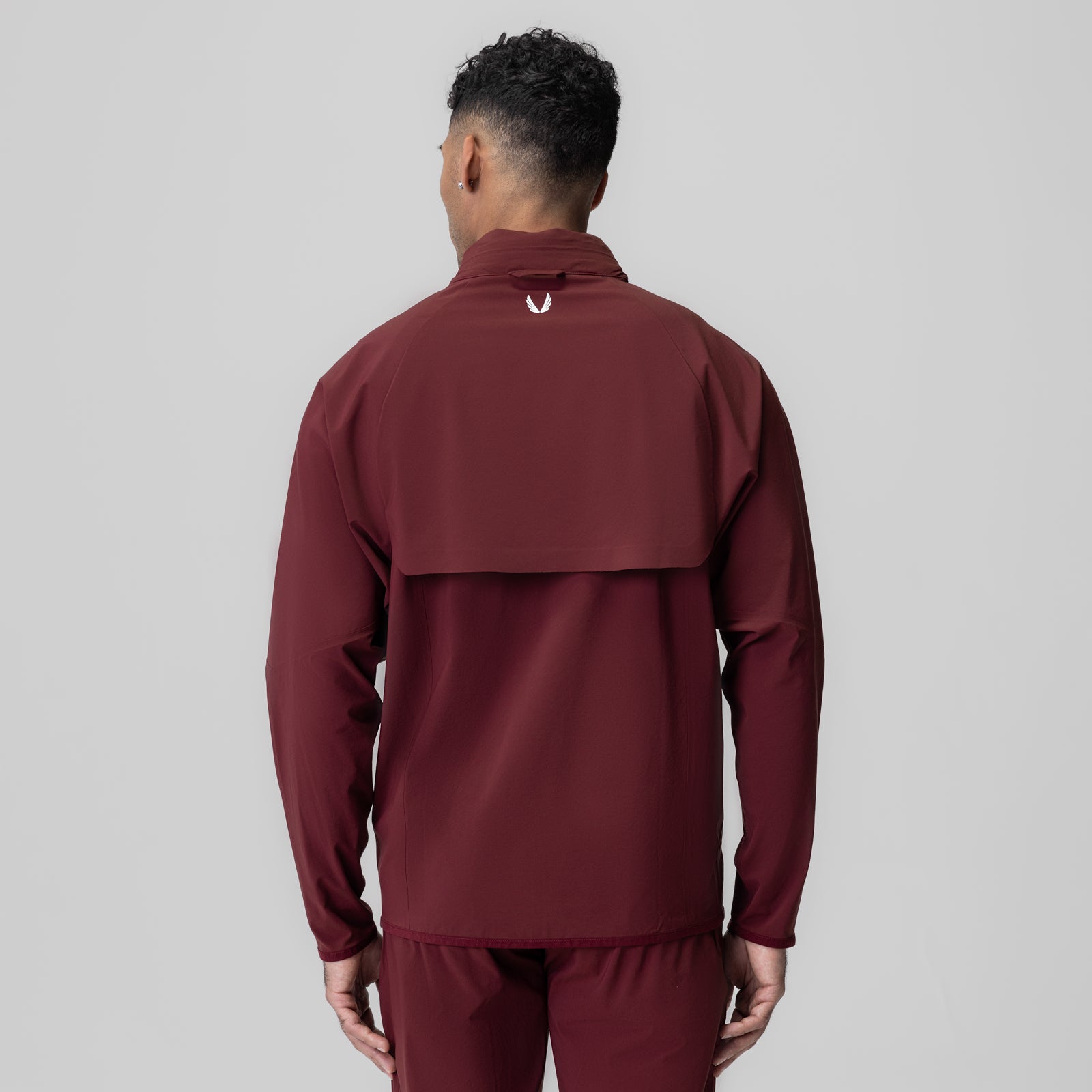 Aerotex Weather-Ready Bonded Windbreaker in crimson, back view on model