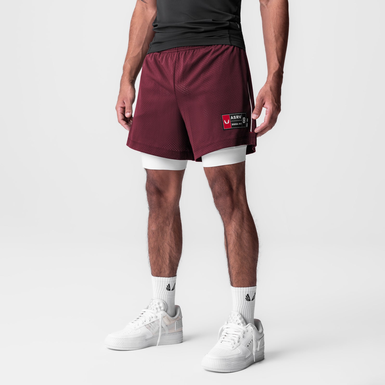 Ion-Mesh 5" Liner Short in crimson with white undershorts, modeled with white sneakers and socks