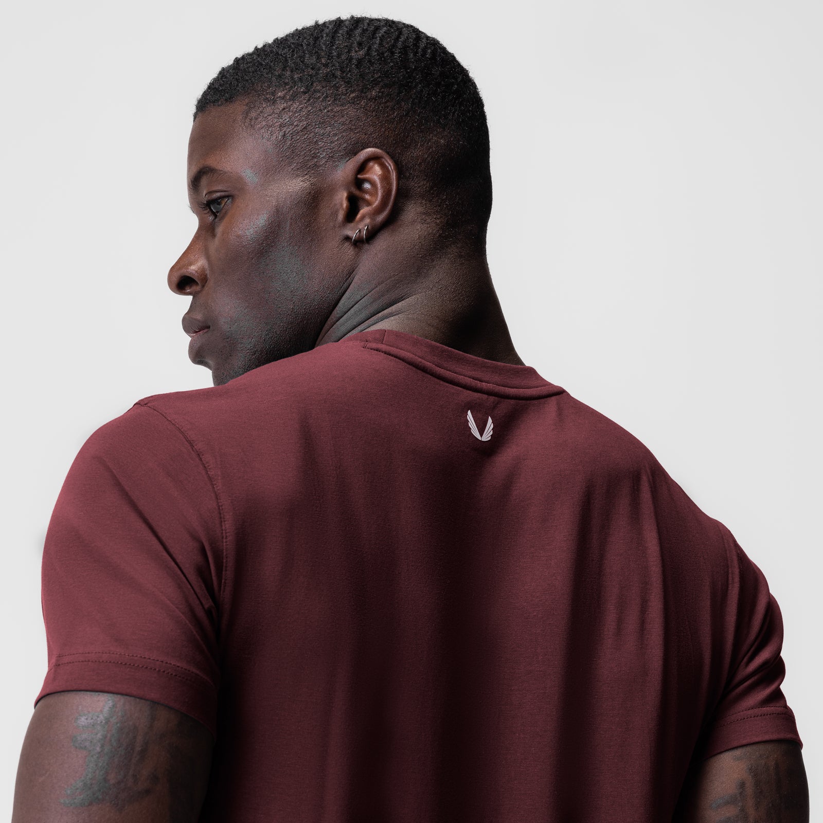 Supima Essential Tee in crimson worn by model, back view