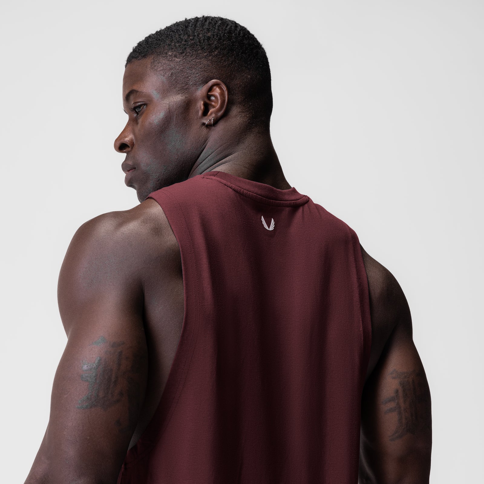 Supima® Muscle Tank in Crimson, model wearing tank from back view