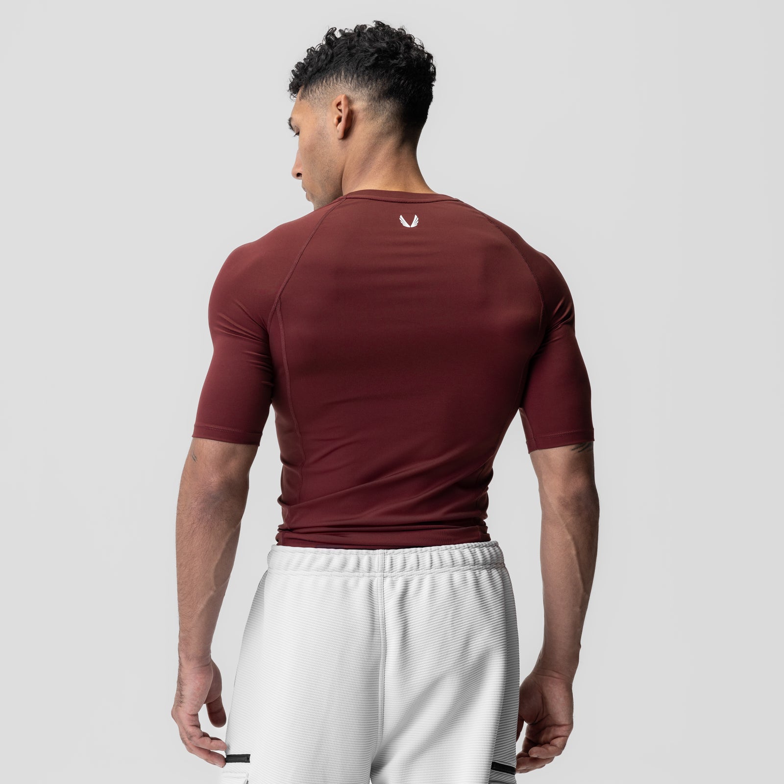 WarpFlexx-Lite® Half-Sleeve Baselayer in crimson, back view on model