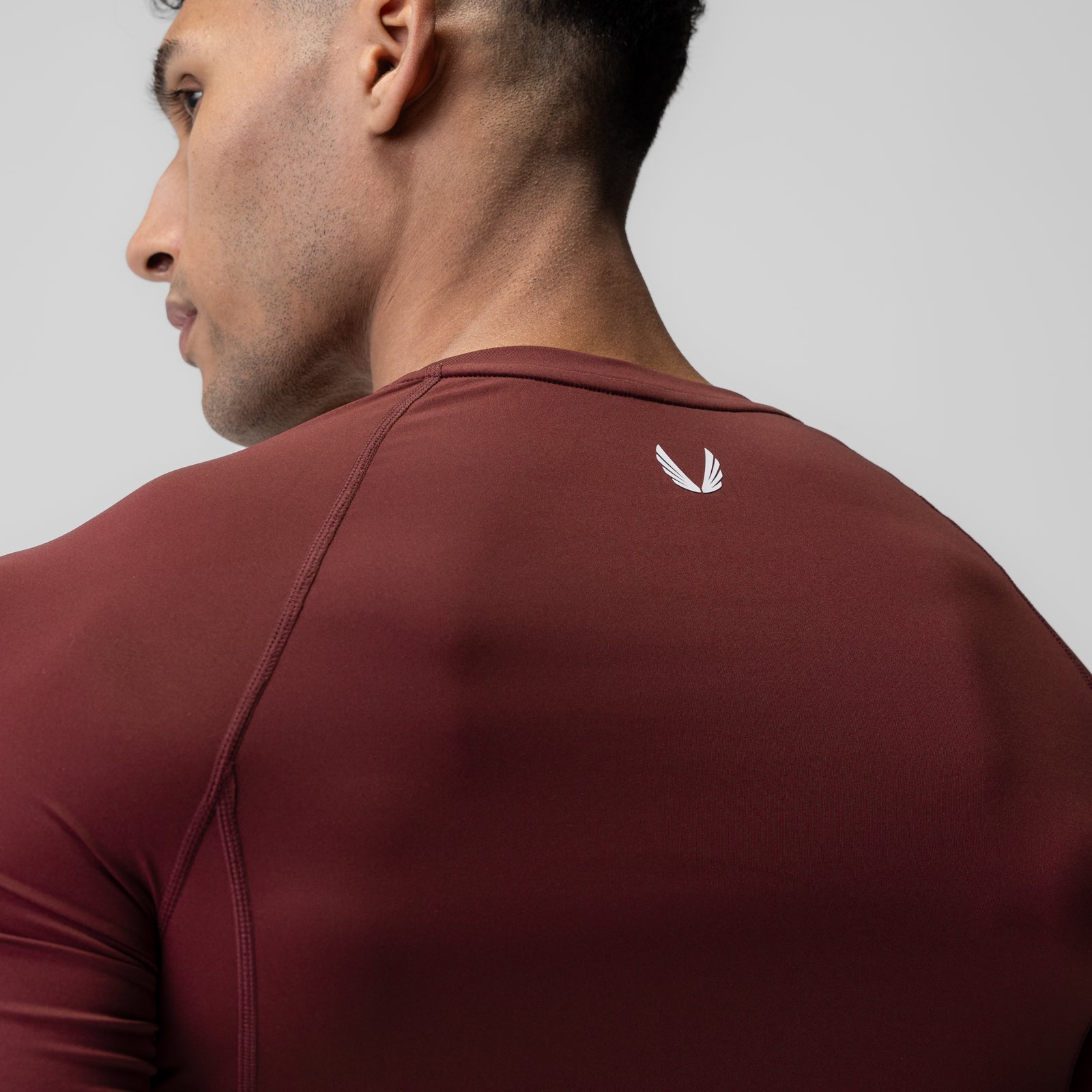 WarpFlexx-Lite Half-Sleeve Baselayer in crimson, worn by model from back