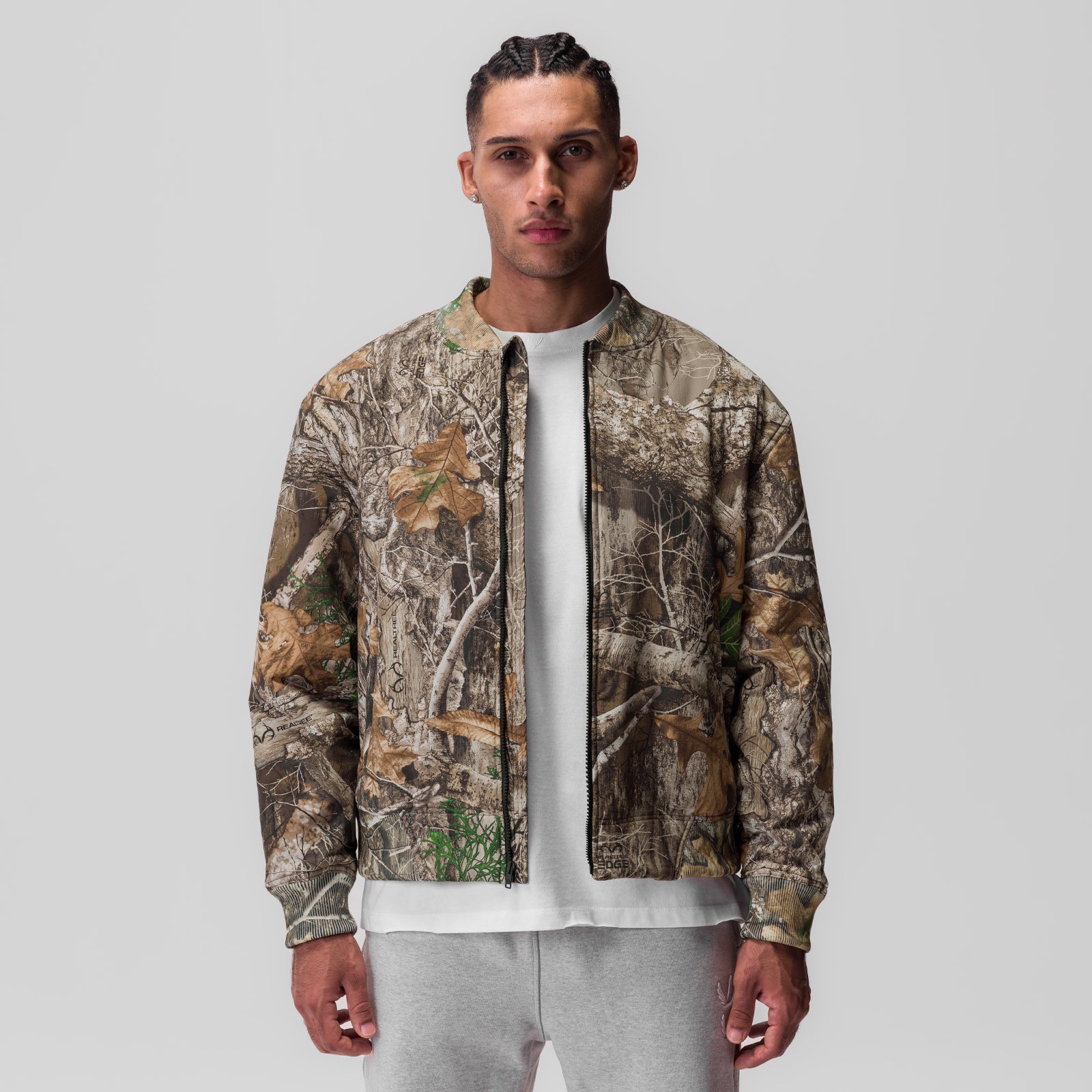 Ripstop Insulated Bomber Jacket in Realtree Camo, worn by model with white tee underneath