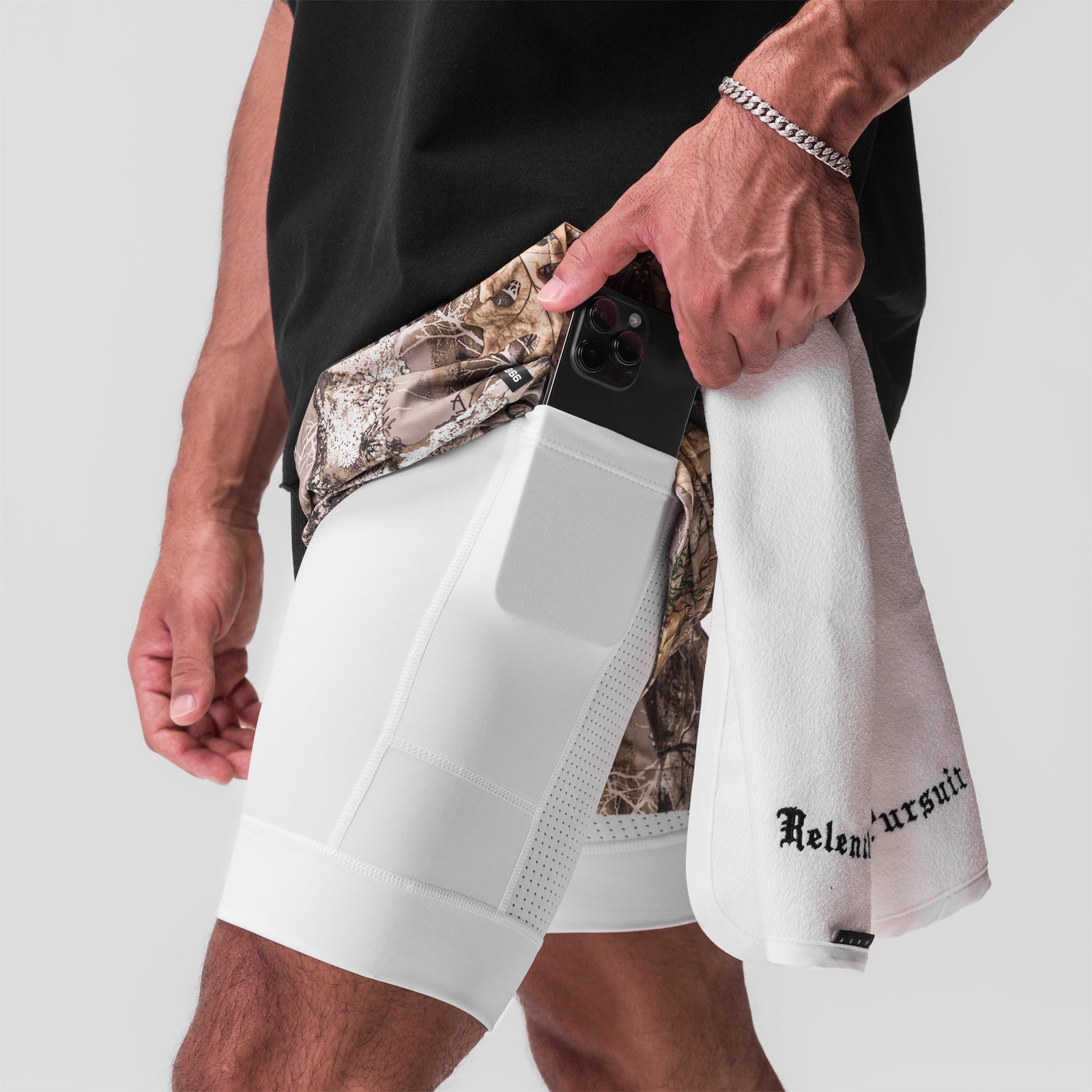 Tetra-Lite Liner Short in Realtree Camo and White, worn by model showing side pocket detail