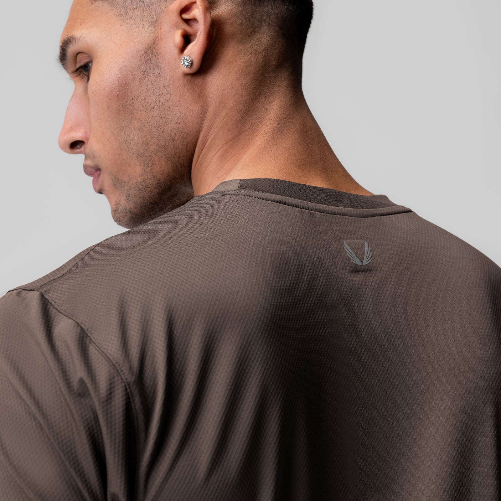 AeroSilver Essential Tee in Deep Taupe, back view on model