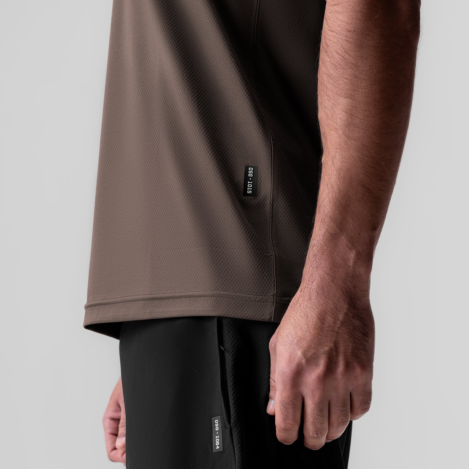 AeroSilver Essential Tee in Deep Taupe, worn by model, side view