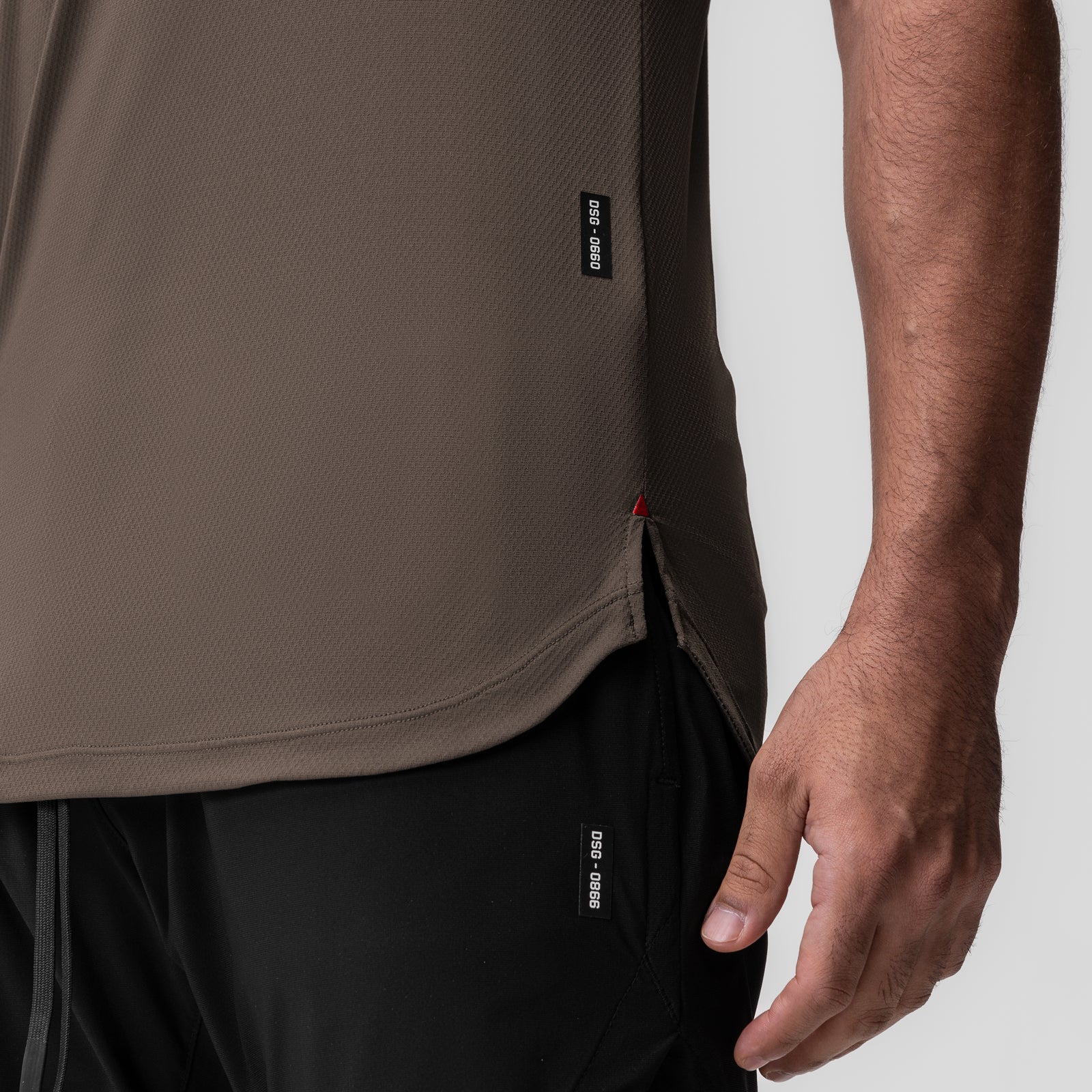 AeroSilver Established Tee in deep taupe worn by model, side view detail