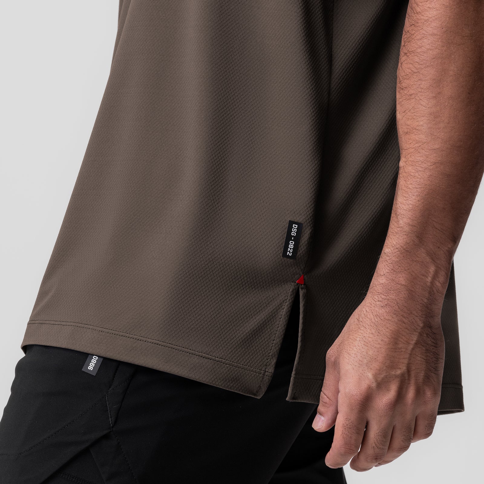 AeroSilver Oversized Tee in Deep Taupe worn by model, side view