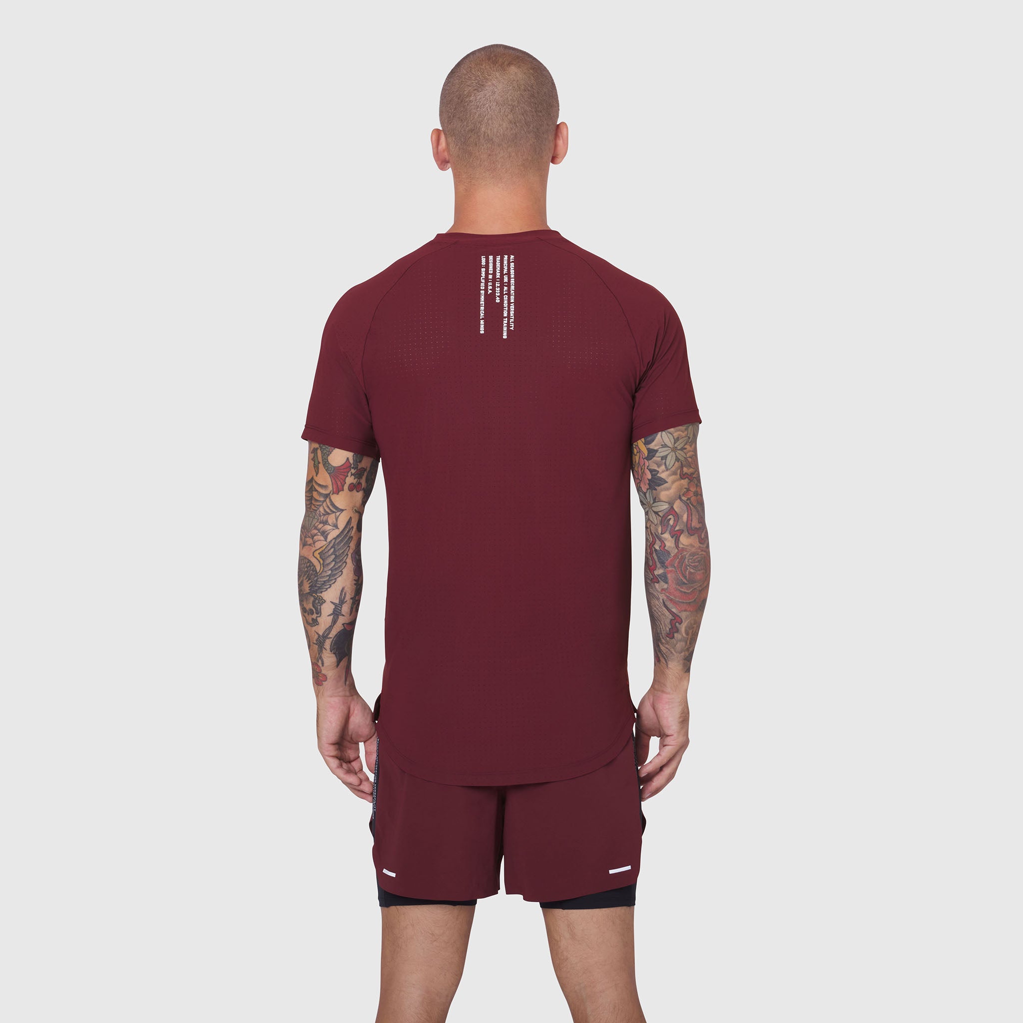 Laser-Vent Established Tee in Crimson worn by male model, back view