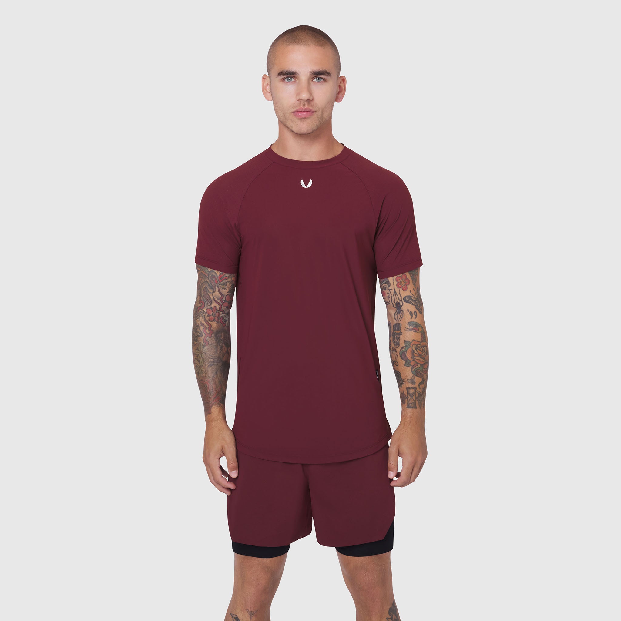 Laser-Vent Established Tee in crimson worn by male model, front view