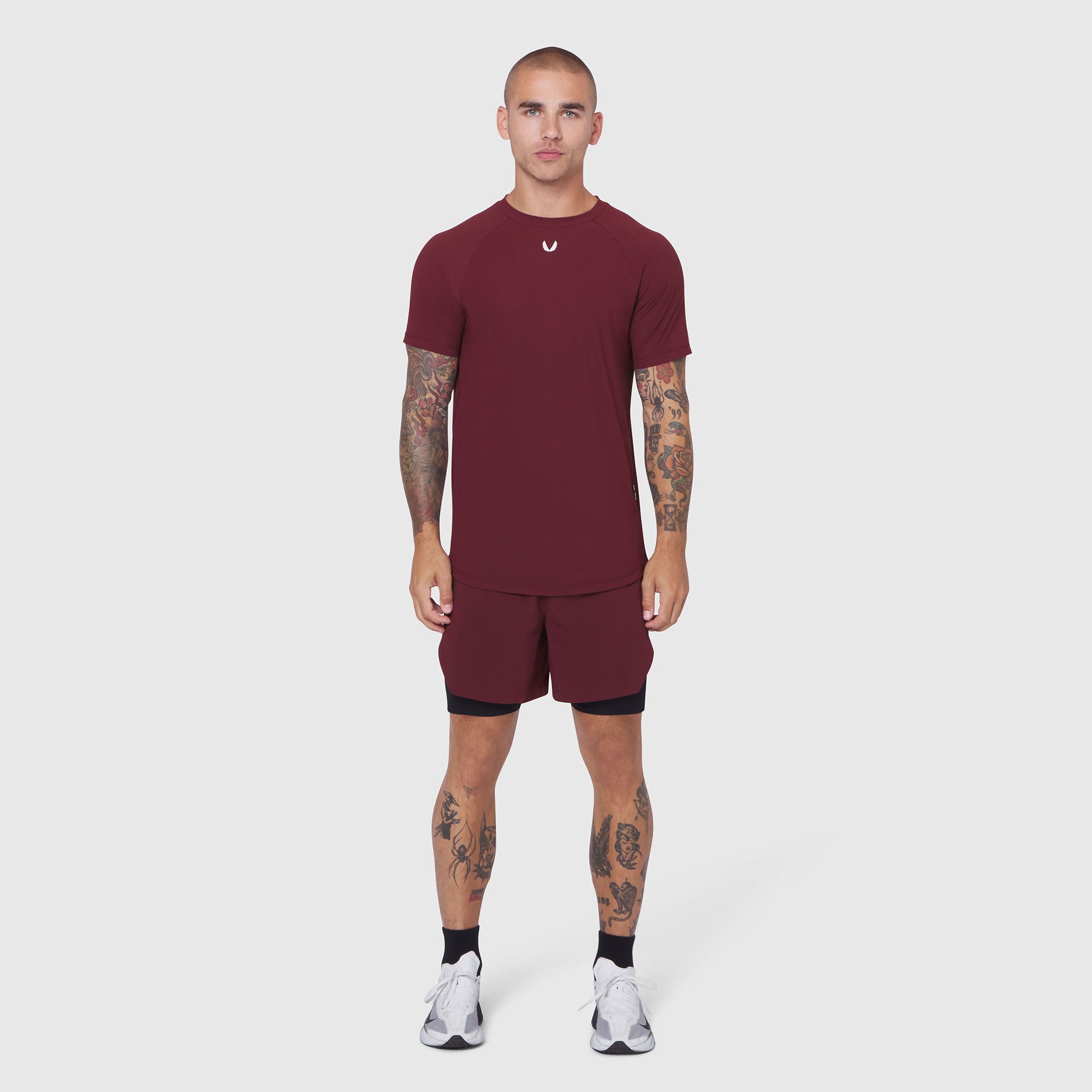 Laser-Vent Established Tee in crimson worn by male model, front view