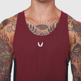 Laser-Vent Singlet Tank in crimson and black worn by male model, front view