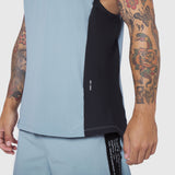 Laser-Vent Singlet Tank in Light Sky/Black worn by tattooed model, front view