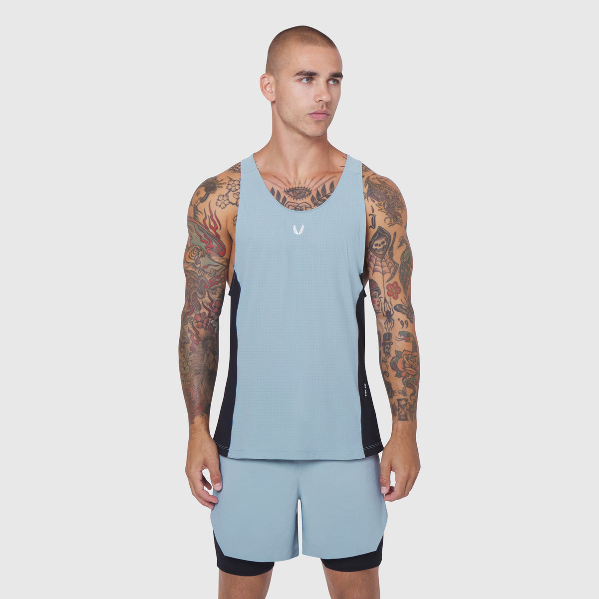 Laser-Vent™ Singlet Tank in light sky and black, worn by male model, front view