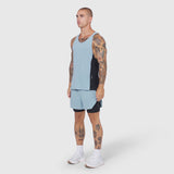 Laser-Vent Singlet Tank in Light Sky/Black worn by male model, side view