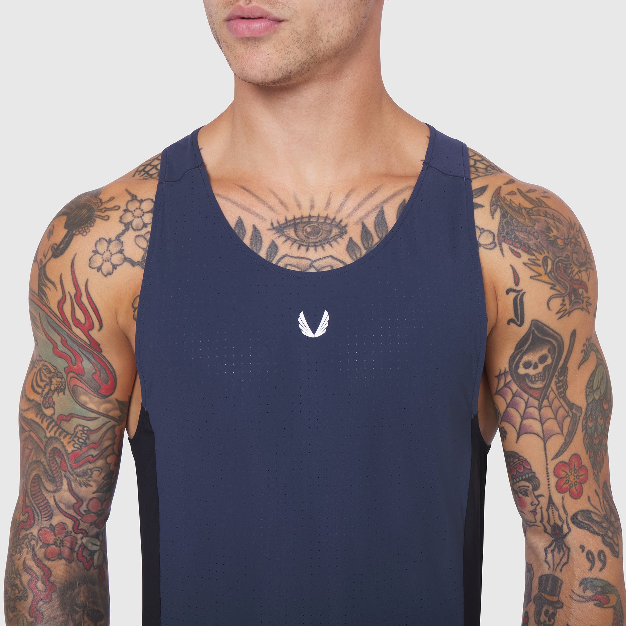 Laser-Vent™ Singlet Tank in Navy/Black worn by male model, front view