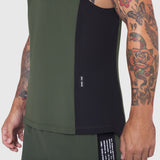 Laser-Vent™ Singlet Tank in olive and black worn by tattooed model, front view