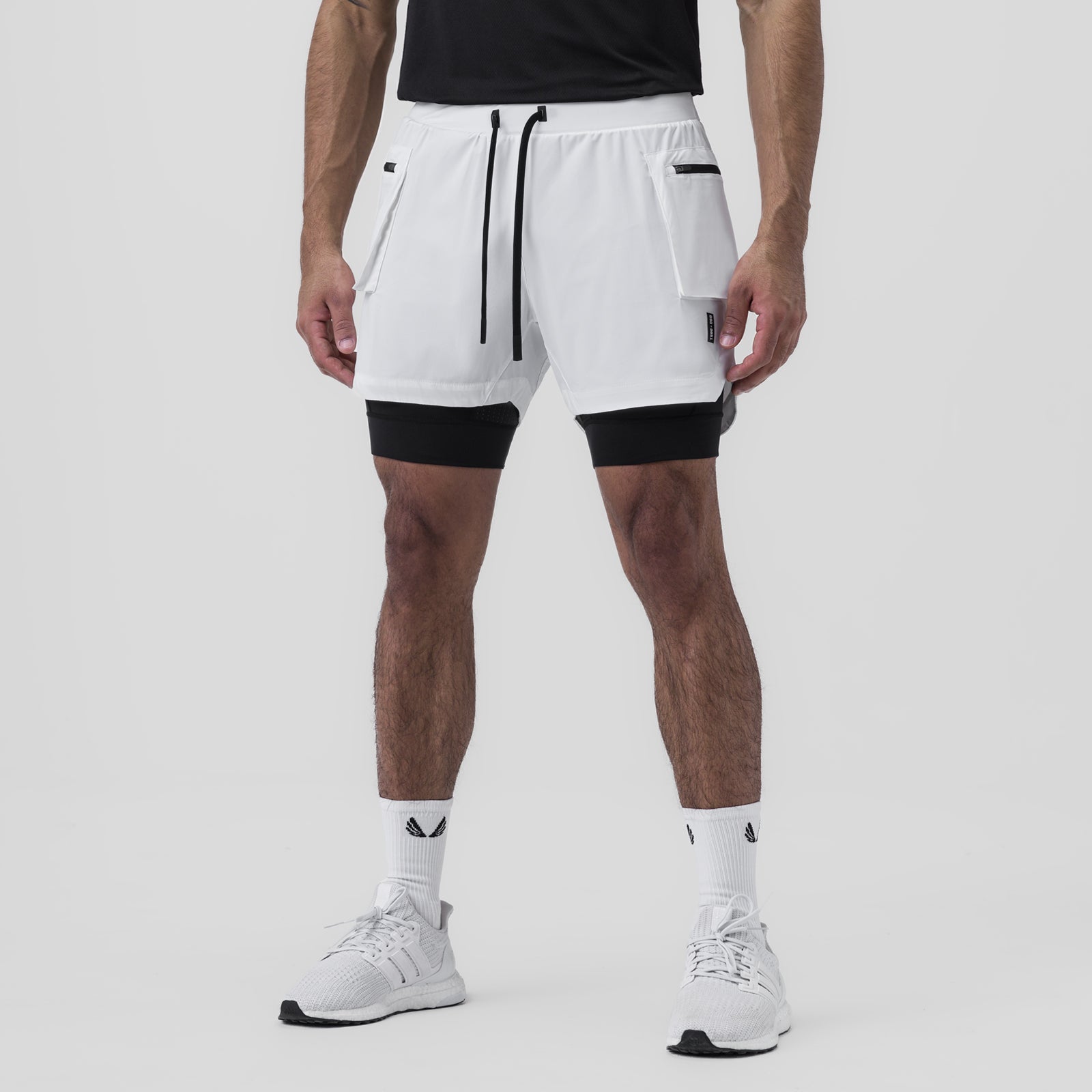 Tetra-Lite Liner Cargo Short in white with black inner shorts, front view on model