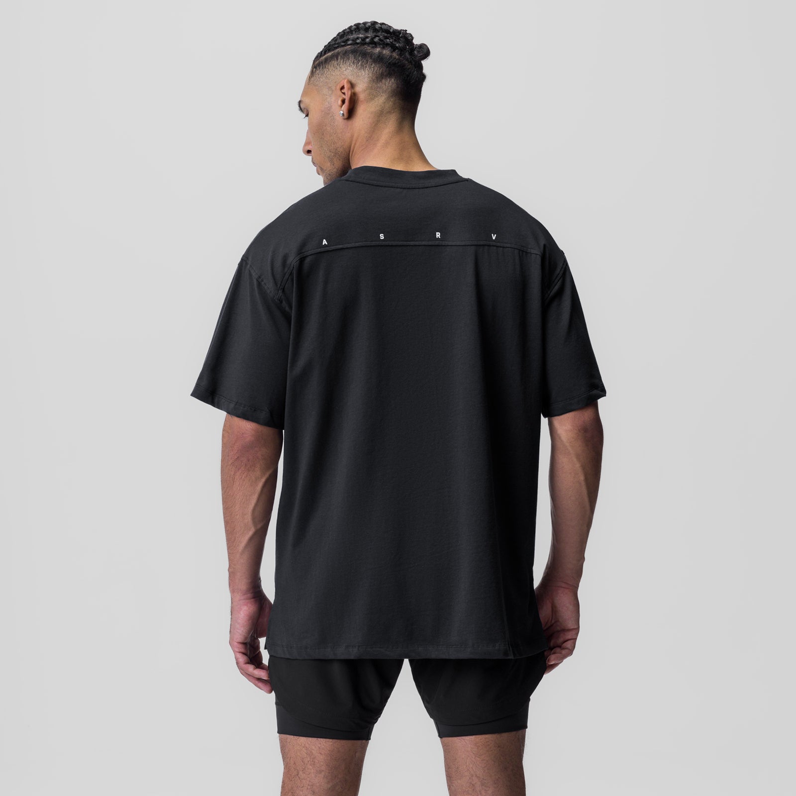 Black Supima® Oversized Tee worn by model, back view