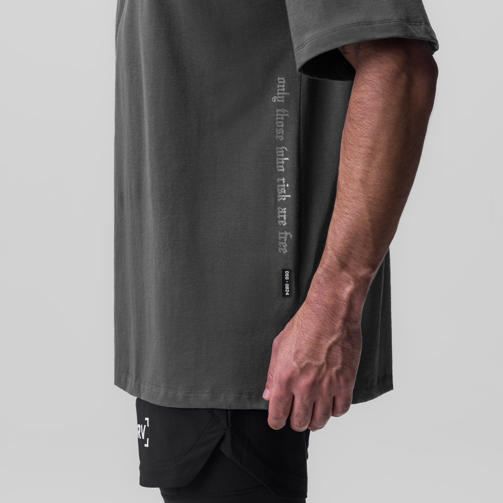 0824 Supima® Oversized Tee in space grey, worn by model showing side view