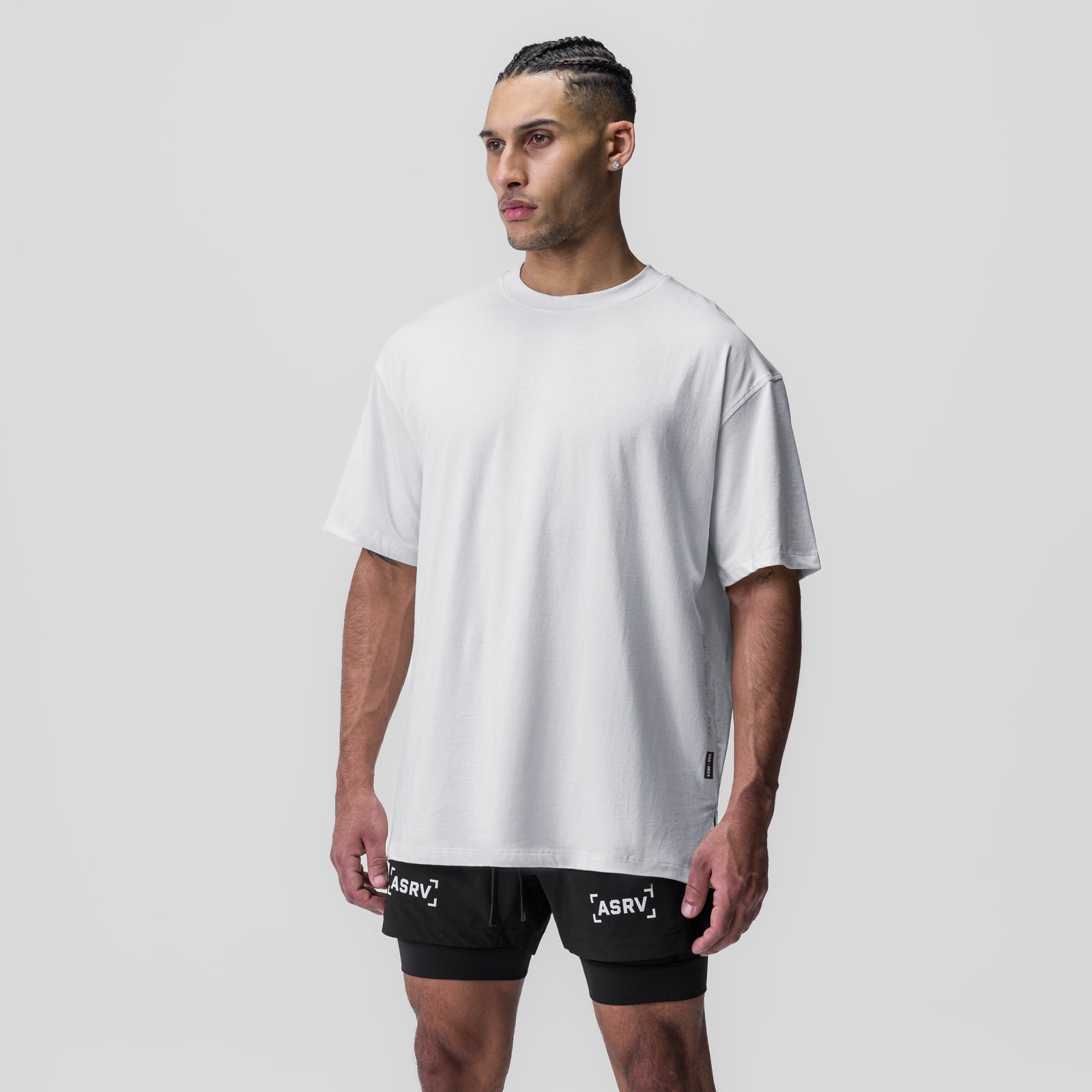 White oversized Supima tee worn with black ASRV shorts, front view on model