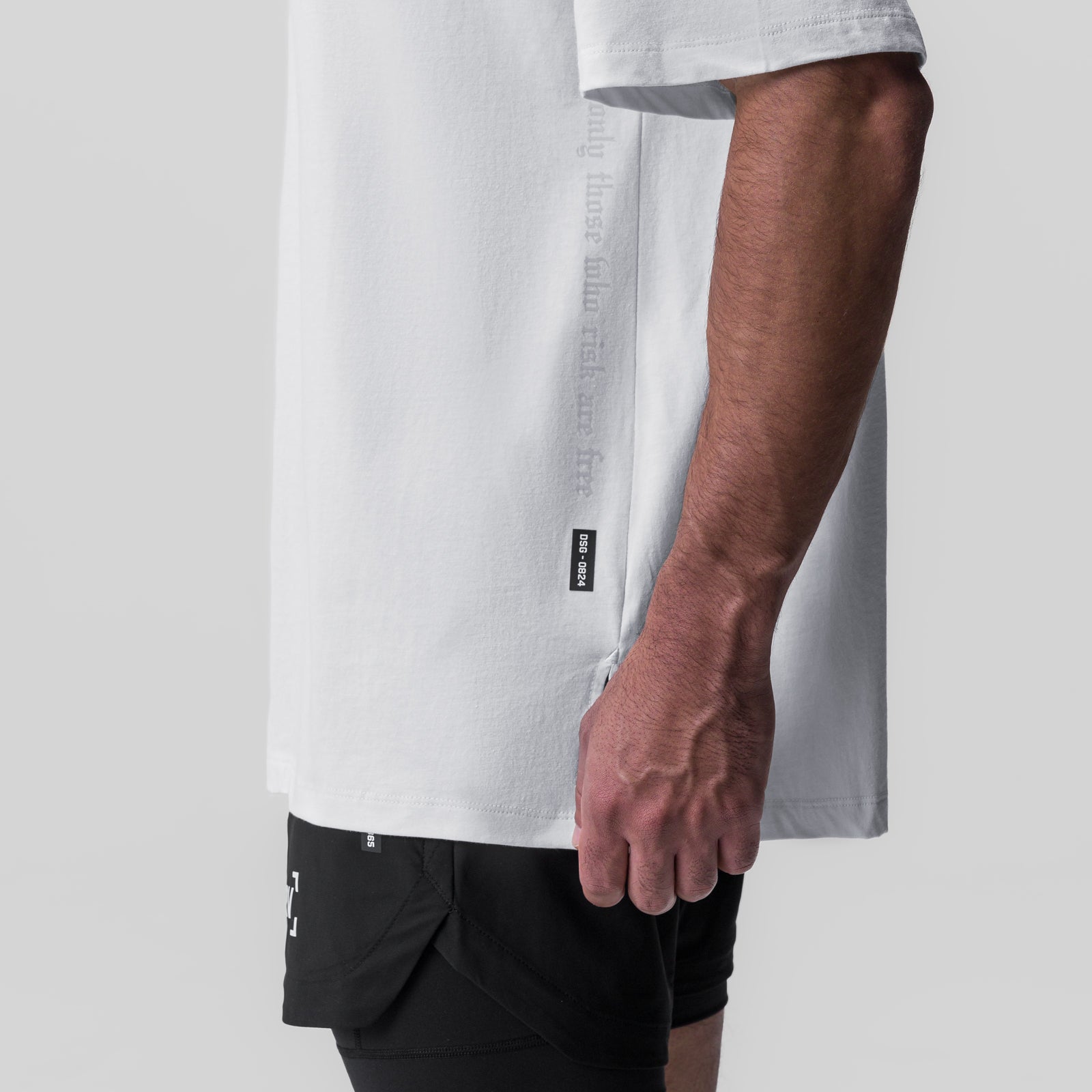 White Supima® Oversized Tee worn by model with black shorts, side view