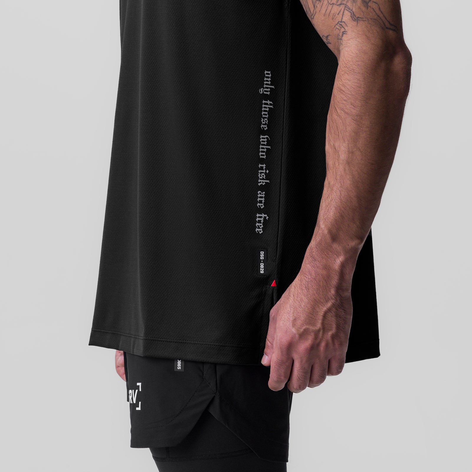 Black Silver-Lite 2.0 oversized cutoff tee on model, side view showing text graphic