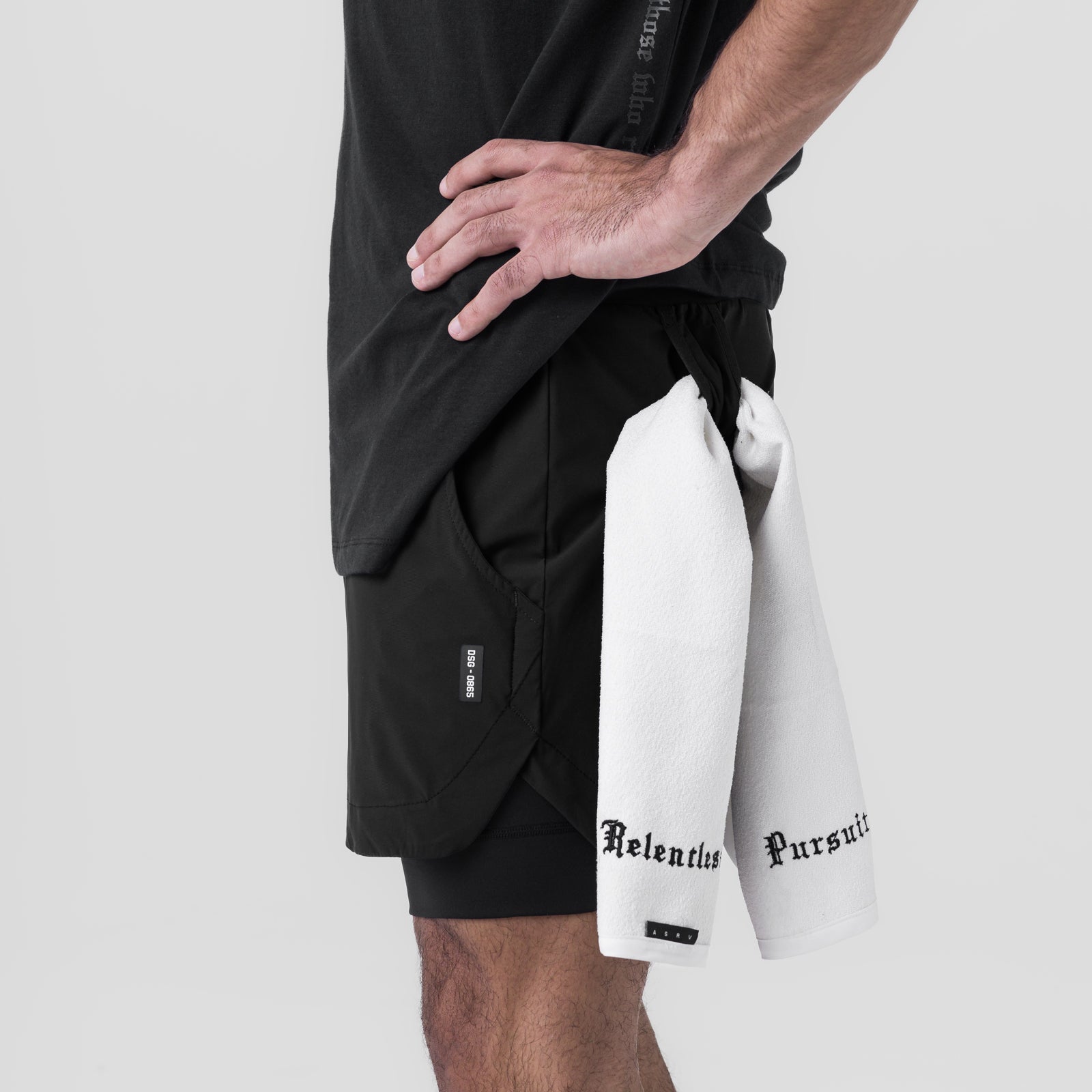 Tetra-Lite 5" Liner Short in black worn by model, side view showing white towel detail