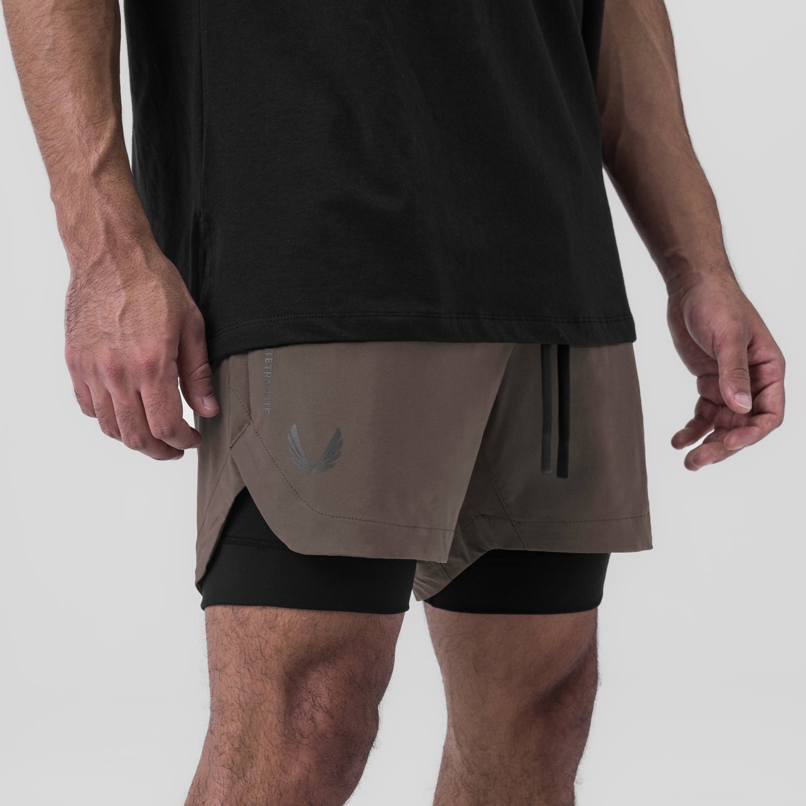 Tetra-Lite 5" Liner Short in Deep Taupe and Black worn by model, side view