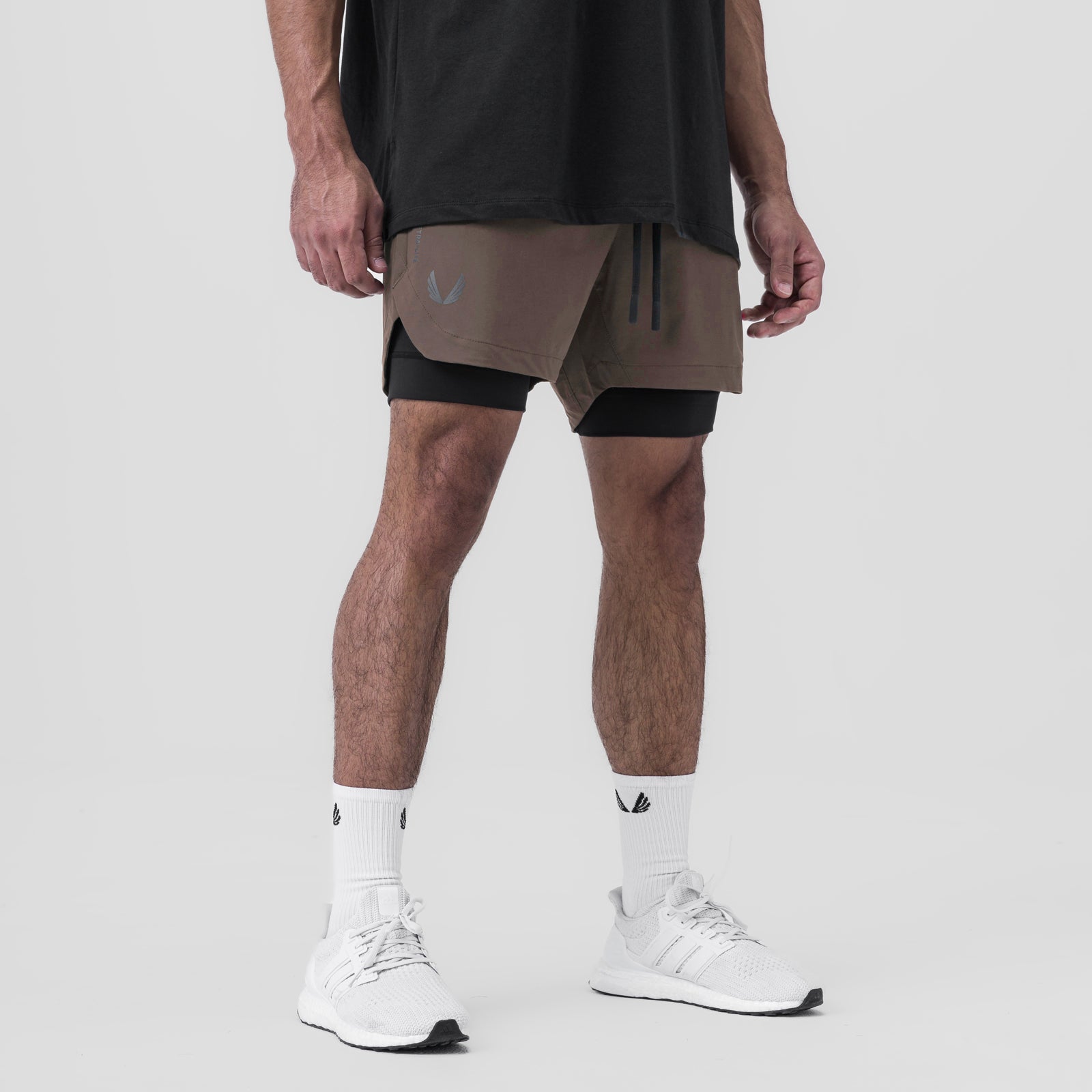 Tetra-Lite 5" Liner Short in Deep Taupe and Black, worn by model standing, front view