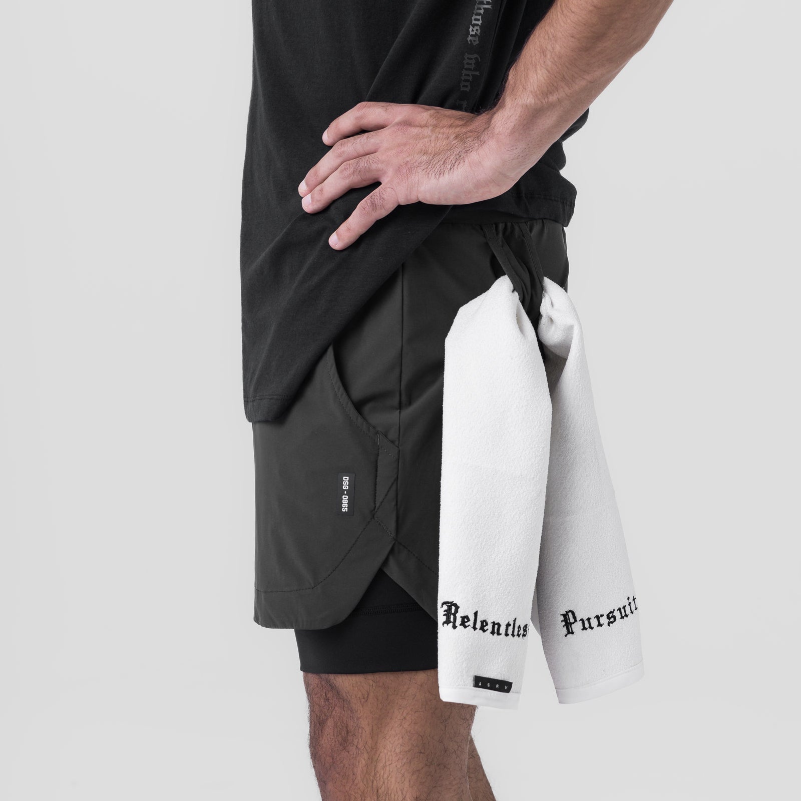 Tetra-Lite 5" Liner Short in Space Grey and Black, modeled with white towel, side view