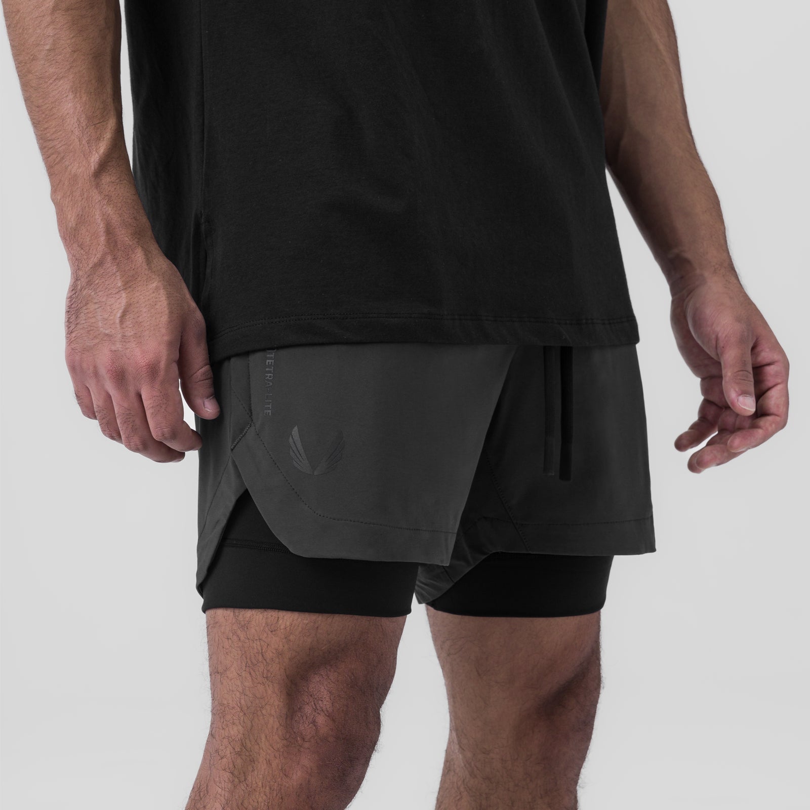 Tetra-Lite 5" Liner Short in Space Grey and Black, worn by model, side view