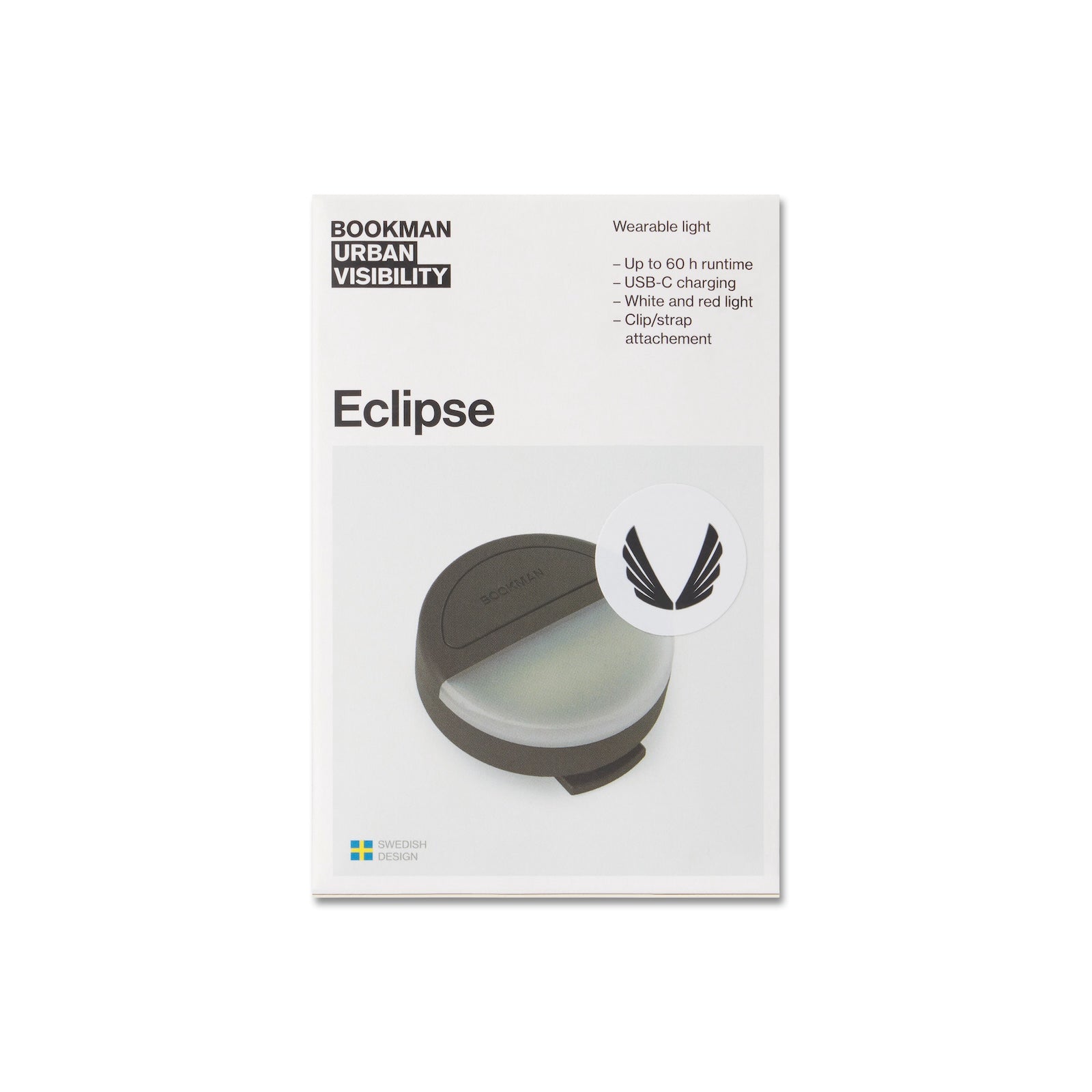 Flatlay of Bookman Eclipse wearable light in black, angled view showing clip attachment