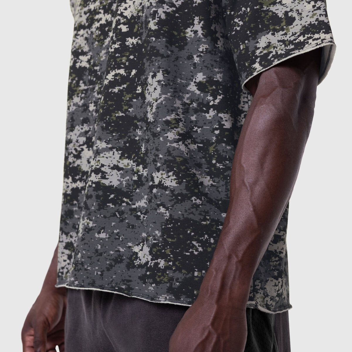 Vintage Raw Hem Pump Cover in pixel camo worn by model, side view