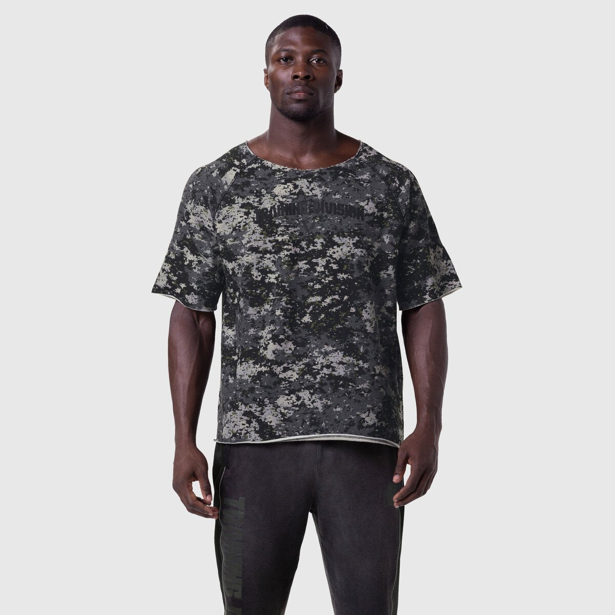 Vintage Raw Hem Pump Cover in pixel camo, worn by model, front view