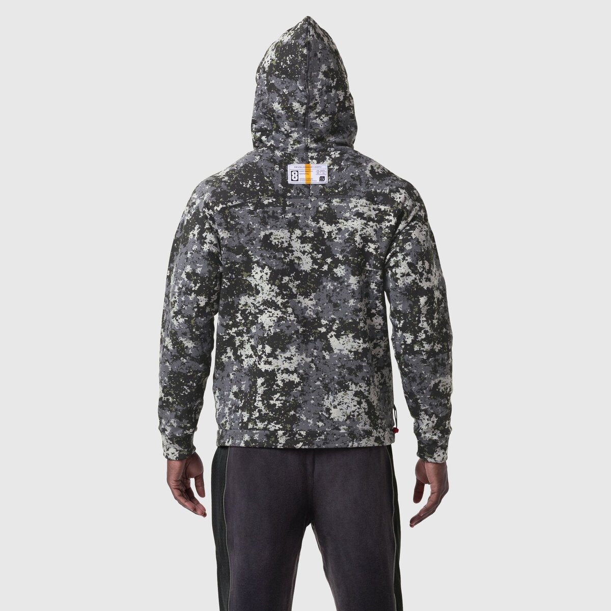 Tech-Terry Training Hoodie in pixel camo black, back view on model
