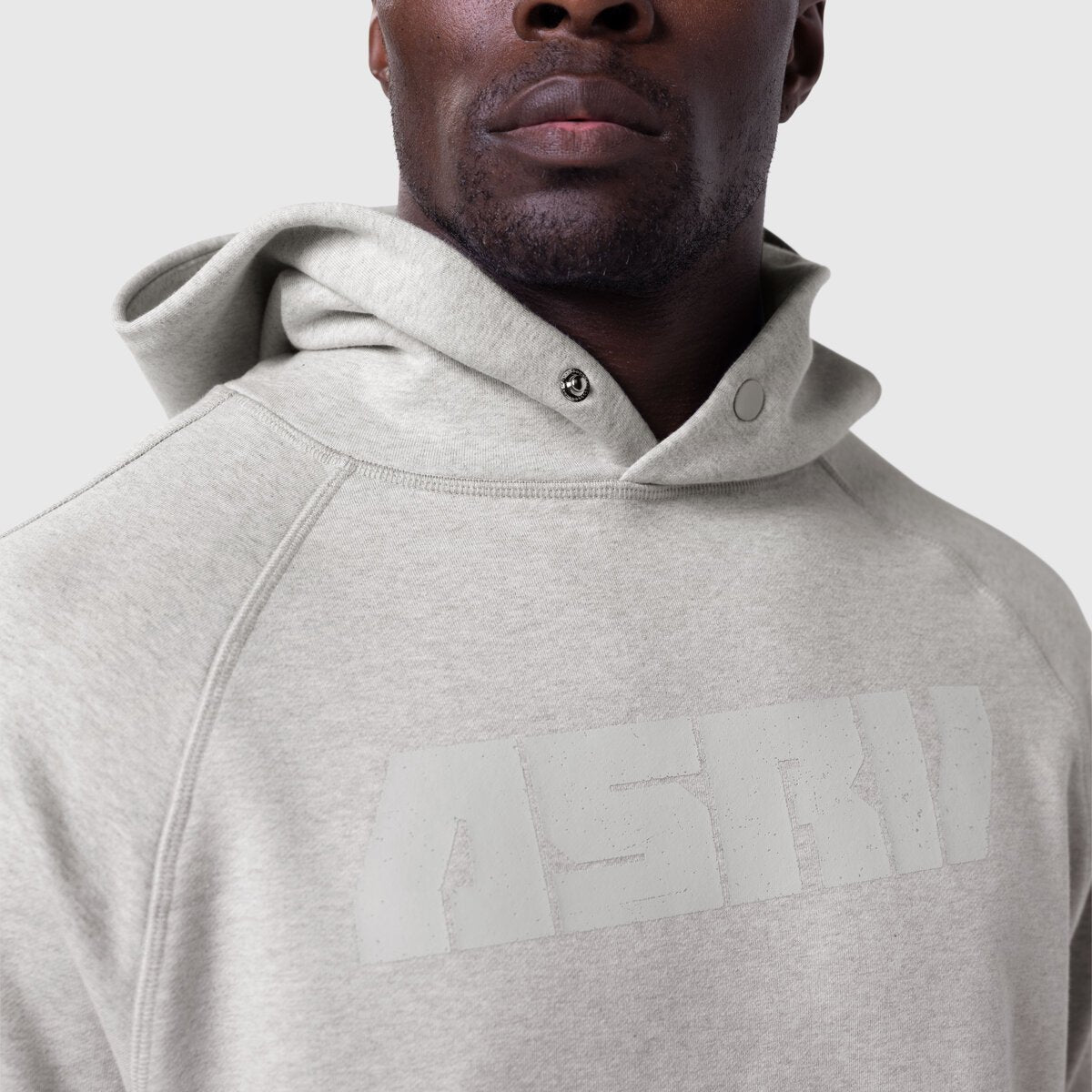 Tech-Terry Training Hoodie in heather grey with 'Blade' logo, worn by model, front view