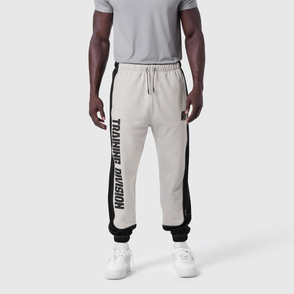Tech-Terry Mesh Panel Sweats in heather grey with black panels, worn by model, front view