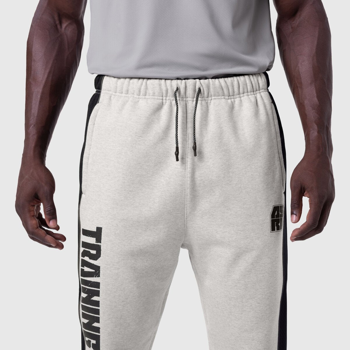Tech-Terry Mesh Panel Sweats in heather grey with black side panels, worn by model, front view