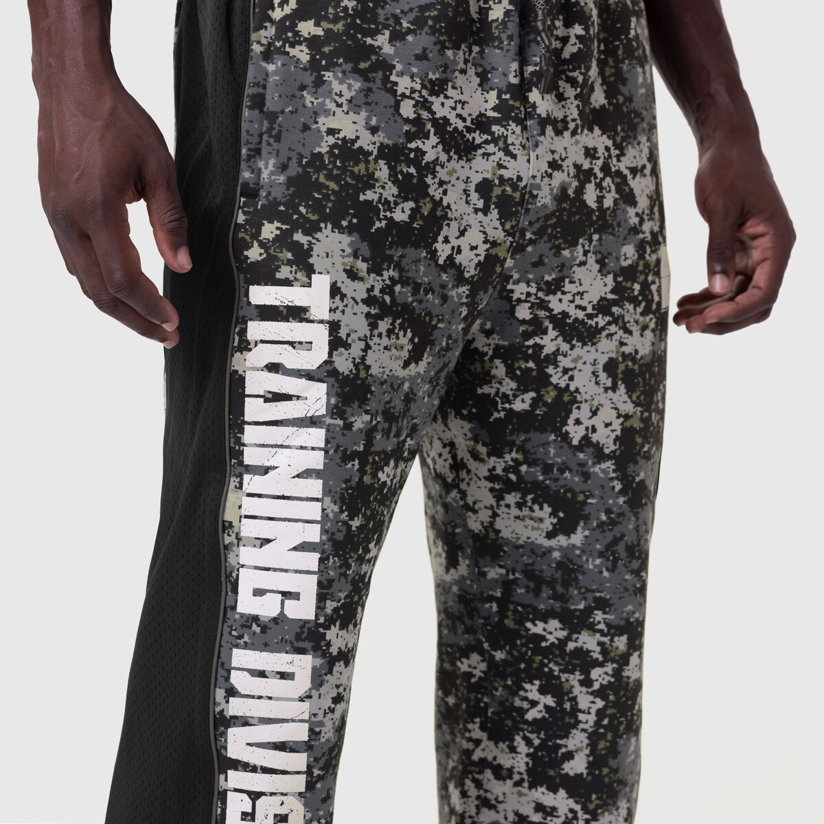 Tech-Terry Mesh Panel Sweats in pixel camo, worn by model showing side leg detail