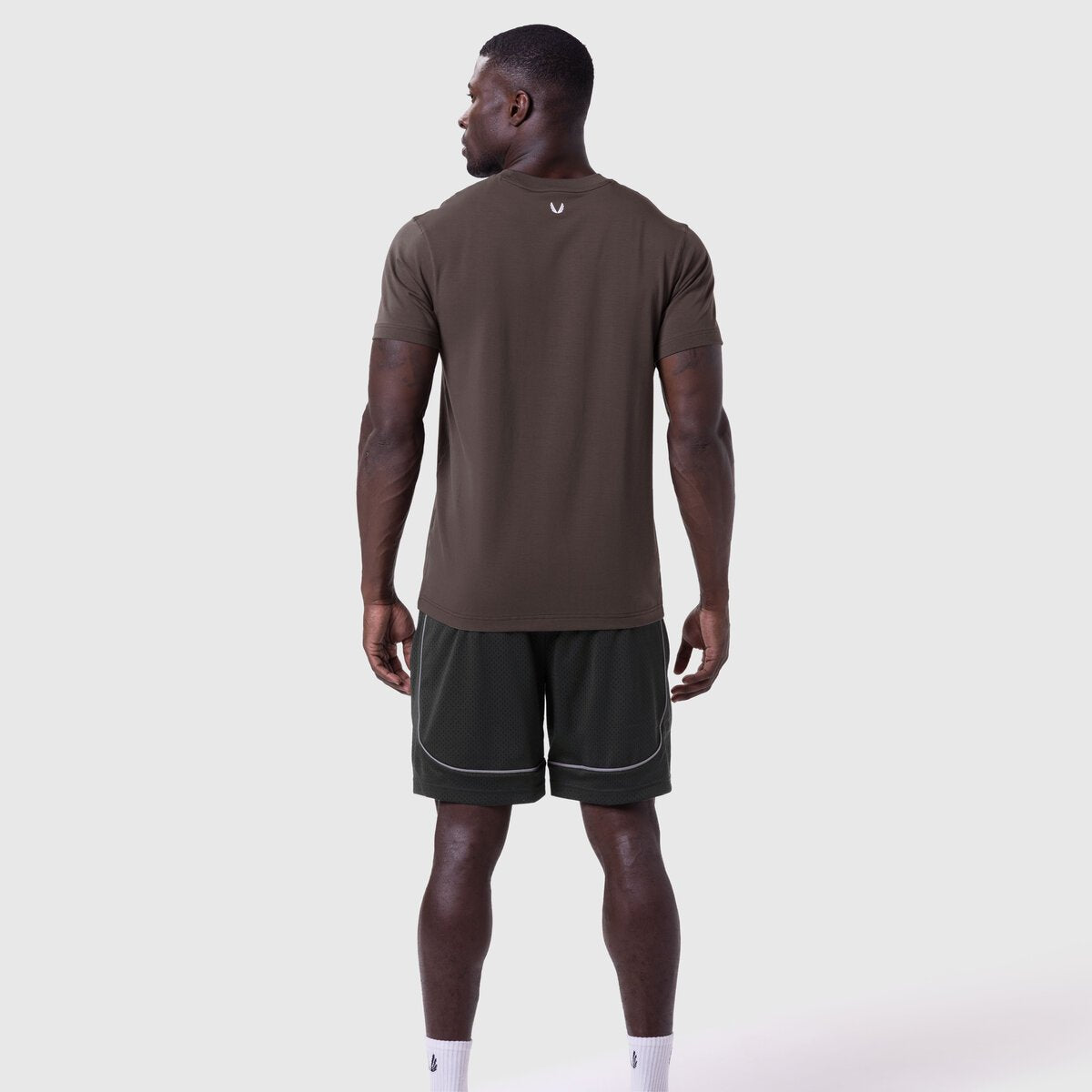 Supima Essential Tee in Dark Earth worn by model, back view
