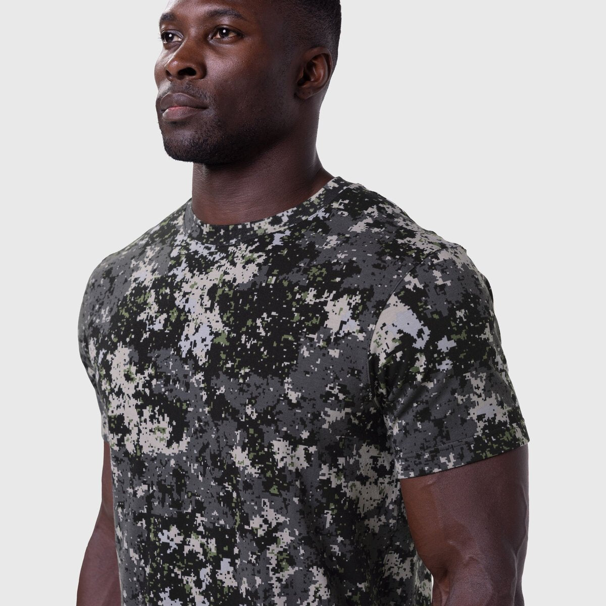 Supima Essential Tee in pixel camo worn by model, front three-quarter view