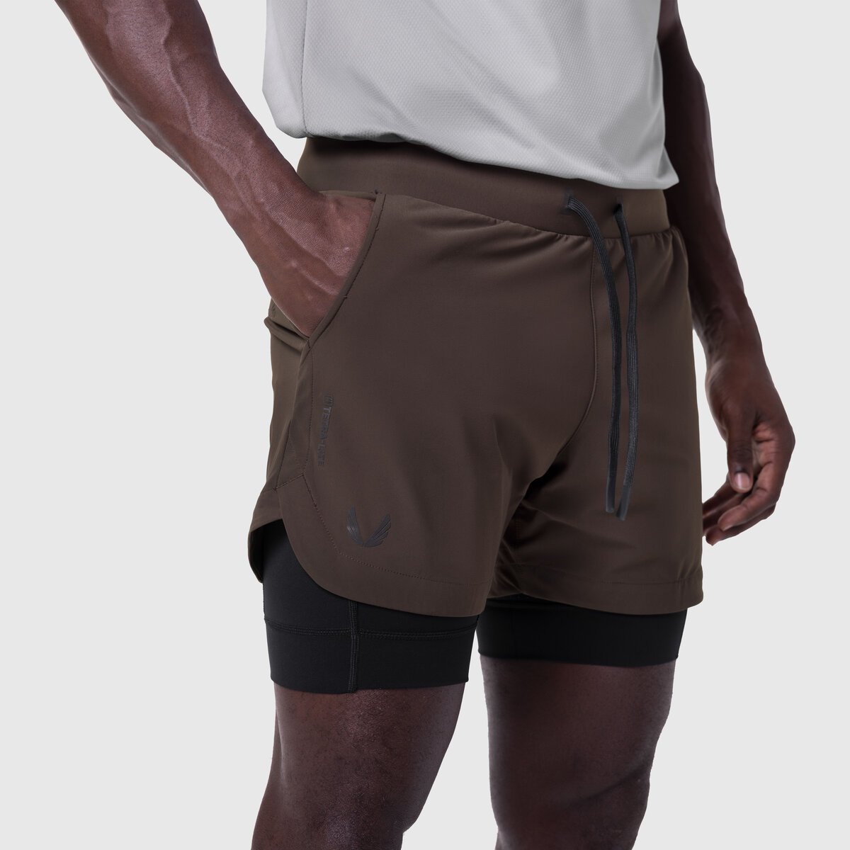 Tetra-Lite 5" Liner Short in Dark Earth and Black, worn by model, side view