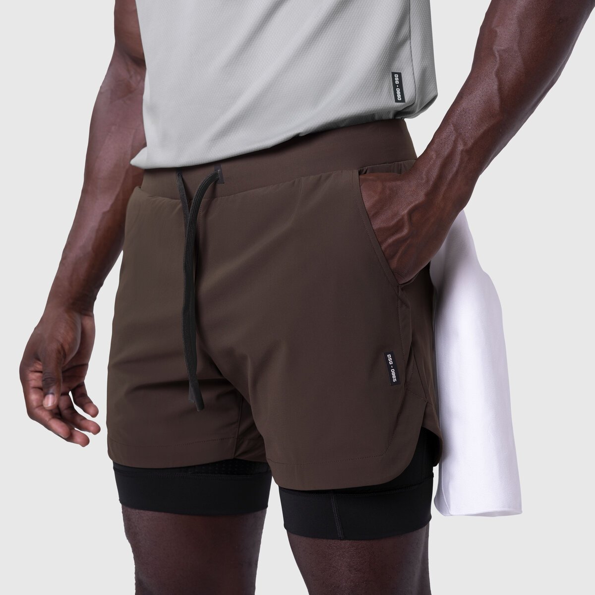Tetra-Lite 5" Liner Short in Dark Earth and Black, worn by model showing front and side view