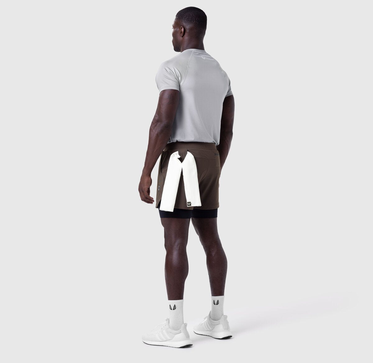 Tetra-Lite 5" Liner Short in Dark Earth and Black, worn by model, back view