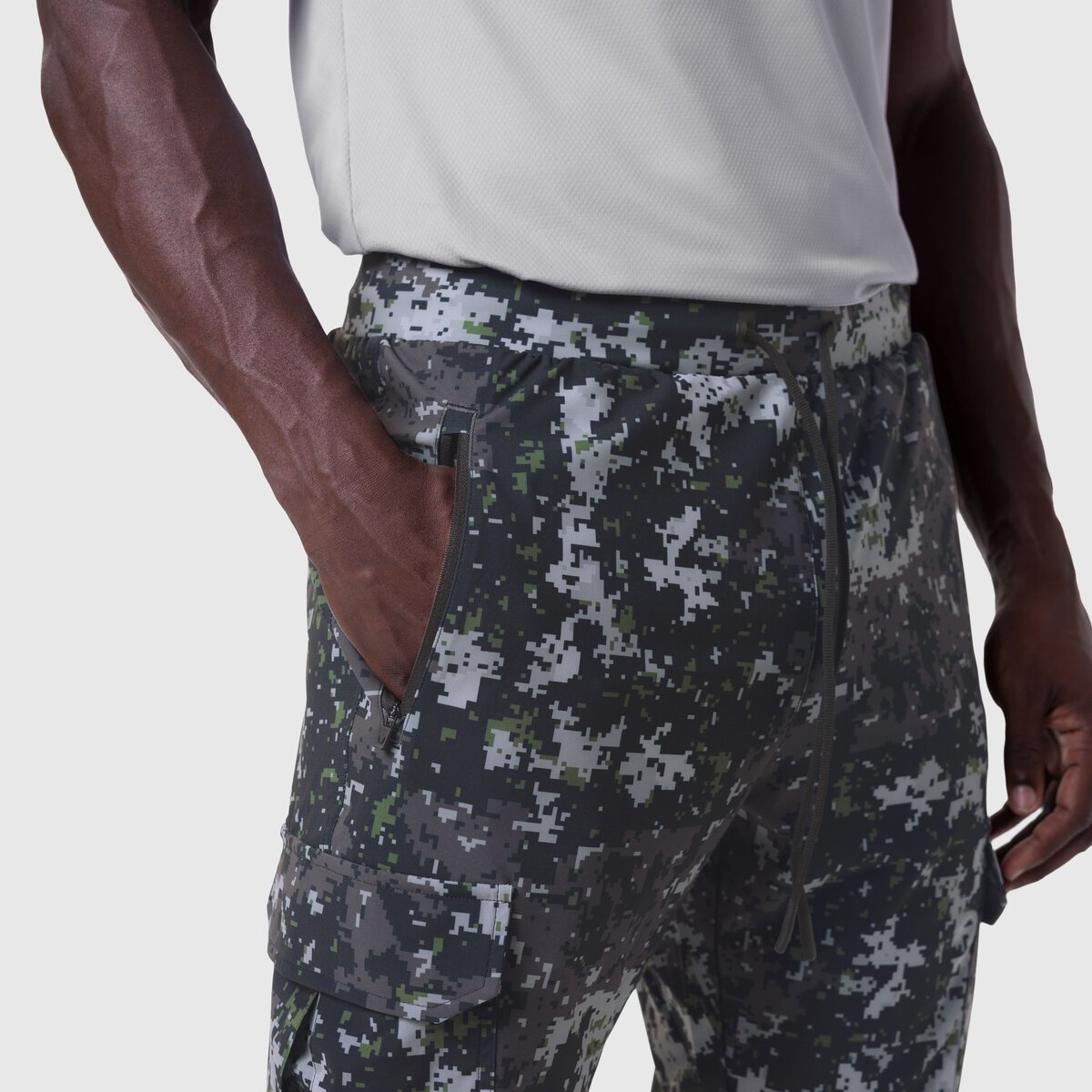 Tetra-Lite Cargo High Rib Jogger in pixel camo, worn by model showing side view with hand in pocket