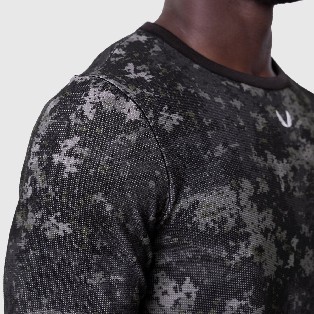 Waffle Knit Longsleeve in pixel camo black, worn by model, shoulder detail view
