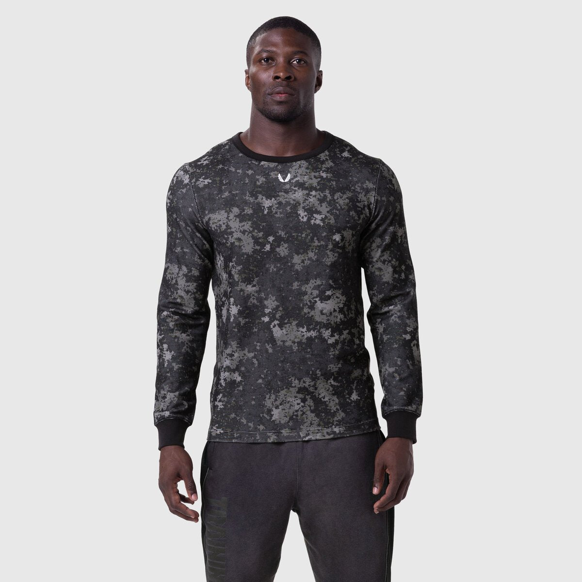 Waffle Knit Longsleeve in pixel camo black, worn by model, front view