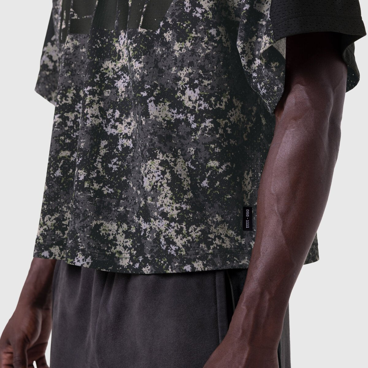 Ion-Mesh Crop Jersey in Pixel Camo worn by model, side view
