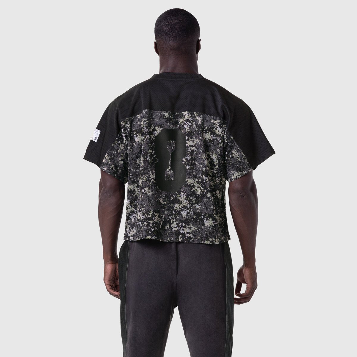 Ion-Mesh Crop Jersey in Pixel Camo worn by model, back view